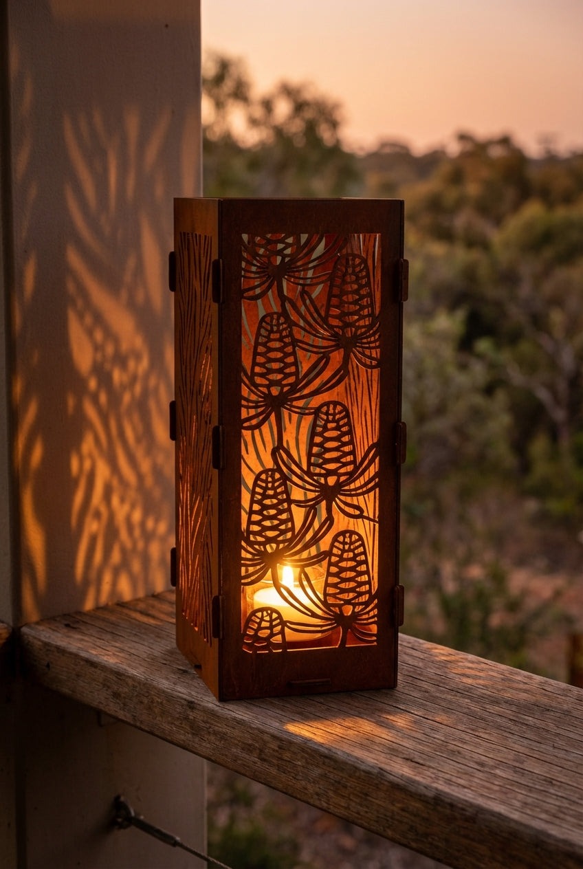 The Ember Tower Candle Lantern - Weathering Steel with lit tealight, lifestyle